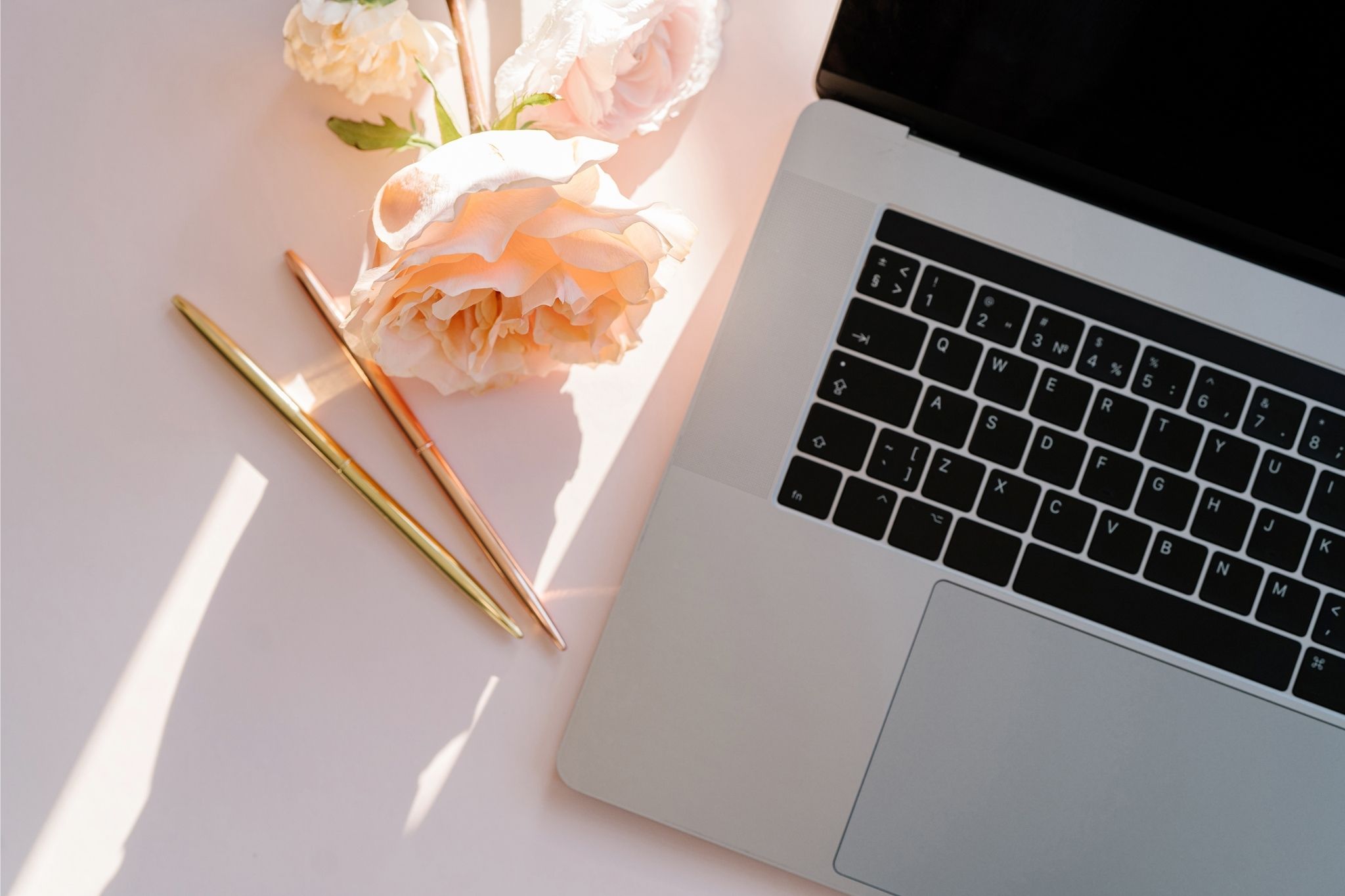 Flowers and laptop: a life update from Melissa.